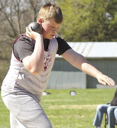 Paula Jasa/Republican LHS’ Taven Borcher gets ready to launch his throw in the boys’ Shot Put event.
