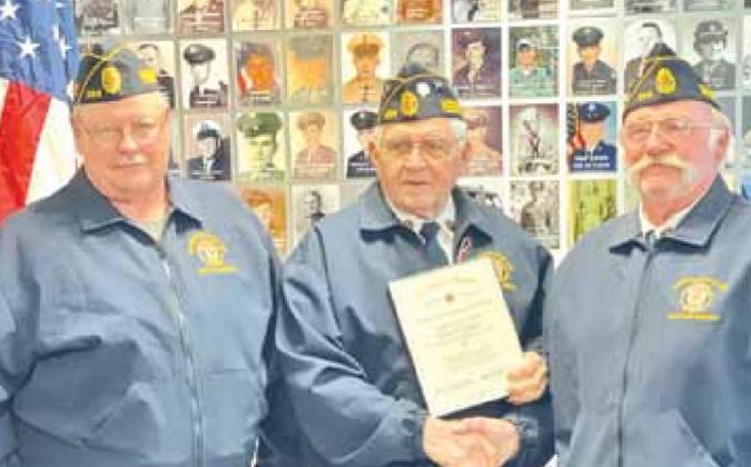Mike Puhalla, middle, receives his 50-year Continuous Service certificate from the American Legion, Brown-Hays Post 289. Left is Tom Hildebrand, Post Commander, and right is Gregg Clement, Adujant. Puhalla is Vice-Commander.