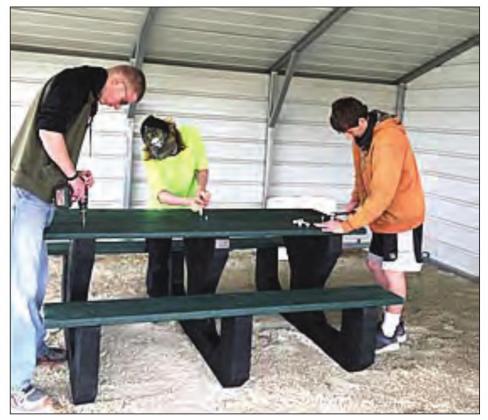A donation brought picnic tables and benches for the gun club.