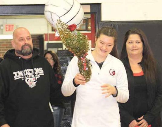 P.C.’s Hailey Dietrich (center) is all smiles on Senior Night with her parents, Richard and Shawna Dietrich. Paula Jasa/Republican