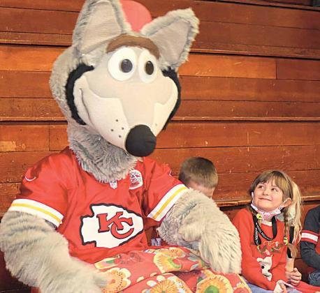KC Wolf had many adoring fans at his show at Lewiston Consolidated Schools Wednesday. This is Eloise Campbell, Kindergarten, Ray Kappel Photos/Republican
